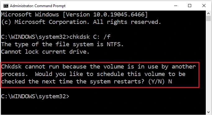 Command Prompt in Windows 10 showing the chkdsk prompt to schedule a check at restart